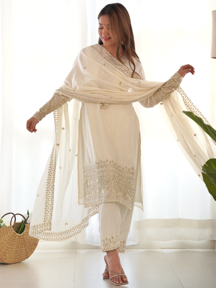 Beautifully coordinated ensemble with matching bottom and dupatta adorned with similar embroidery work