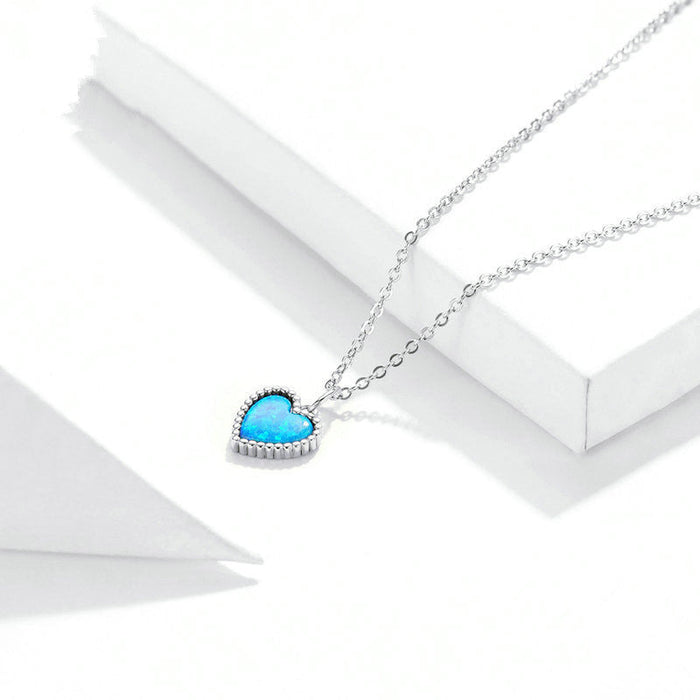 Deep Blue Heart Necklace by Qivii