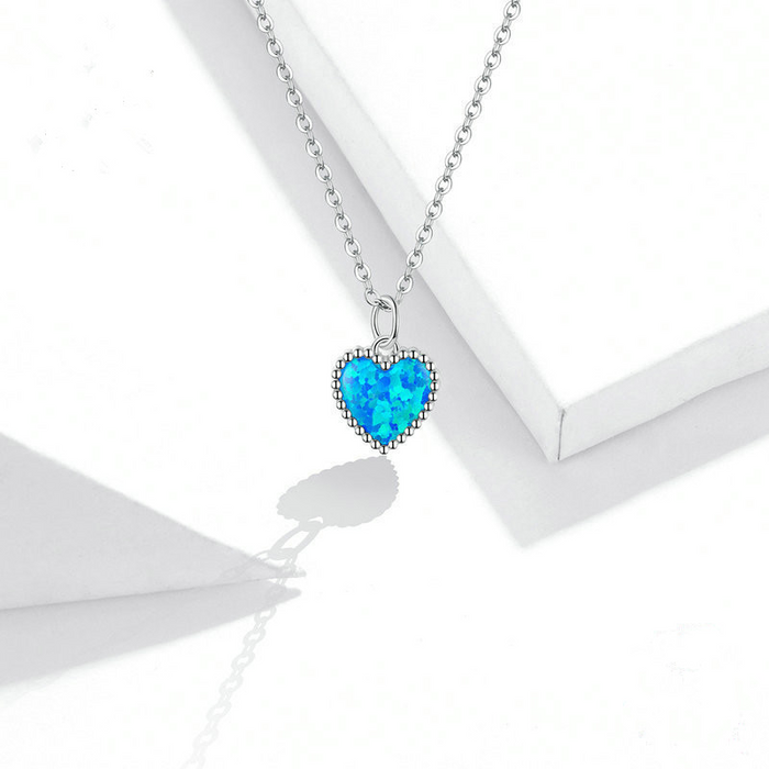 Deep Blue Heart Necklace by Qivii