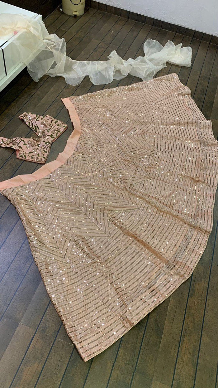 Beautiful Lite Pink Kasturi silk lehnga with intricate zari and sequence work
