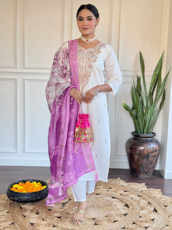 Off-white viscose pant suit with intricate thread embroidery and sequin work